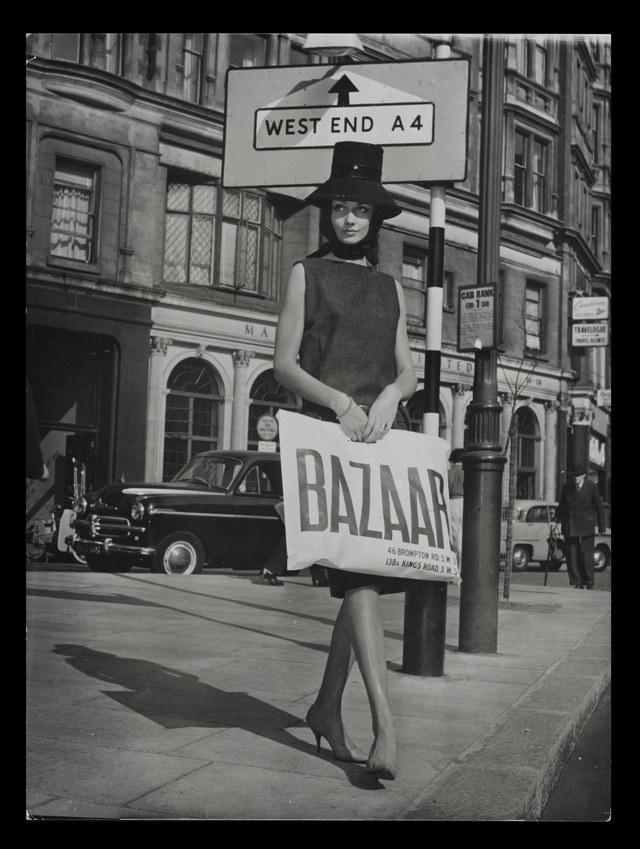 A model holding a bag from Bazaar, Mary Quant's Kings Road boutique, circa 1959. .jpg